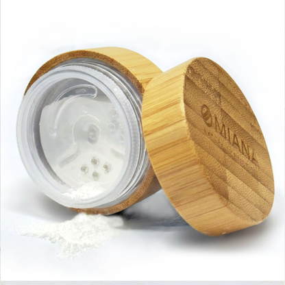 Omiana Mineral Veil finishing powder titanium dioxide-free mineral makeup in  Bamboo container with white powder on a white background